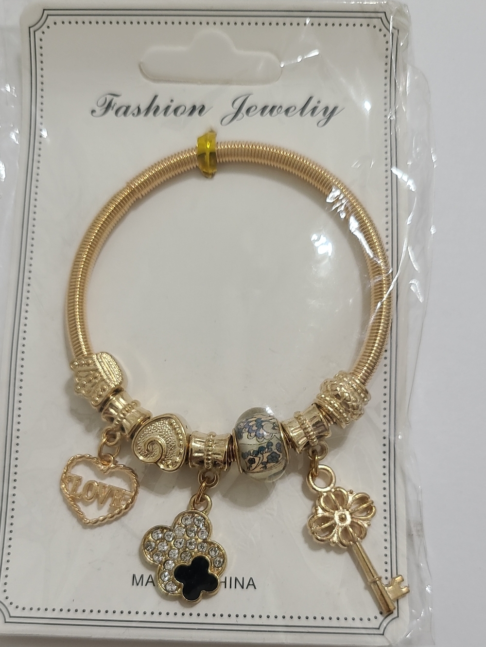 Fashion Jewelry Gold-Tone Bracelet w Accent Bead, Heart, Clover Key Charms